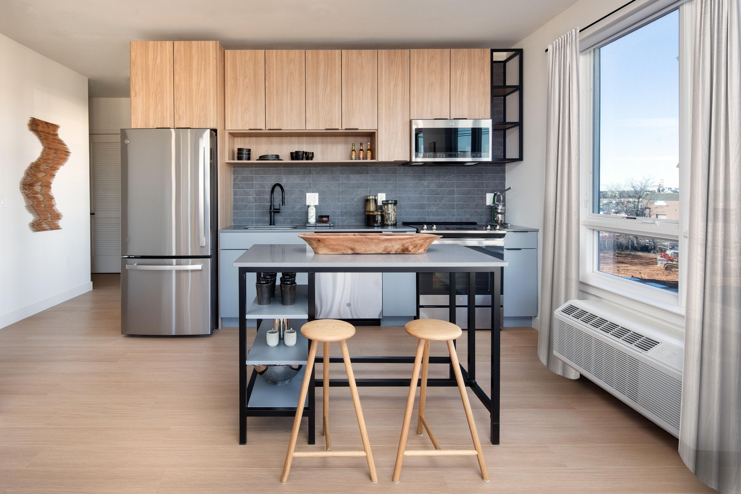 Kitchen with island and stainless steel appliances